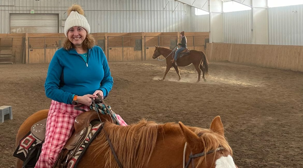 Hilary on a horse at Vista Verde Ranch