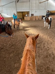 on a horse at Vista Verde Ranch